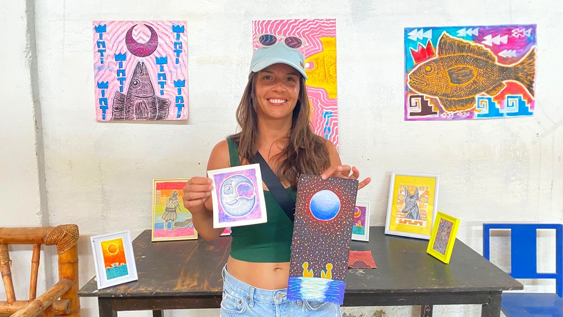 A workshop guest with work she made